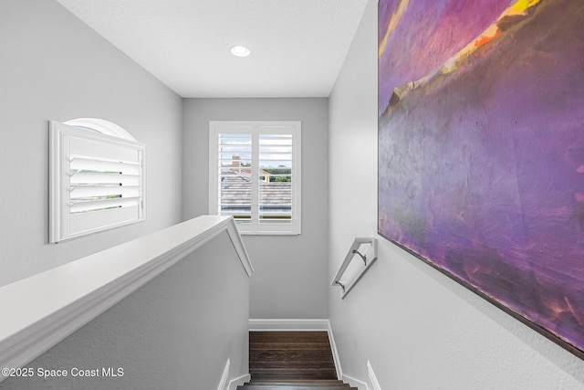 11 Pisces Ln, Rockledge, FL 32955 - staircase featuring wood finished floors and recessed lighting