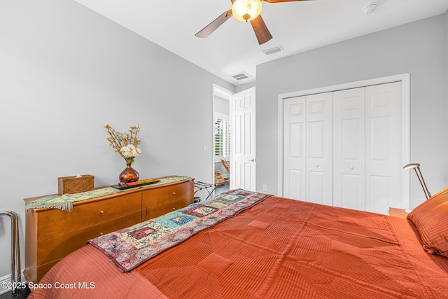 11 Pisces Ln, Rockledge, FL 32955 - bedroom with a closet and a ceiling fan