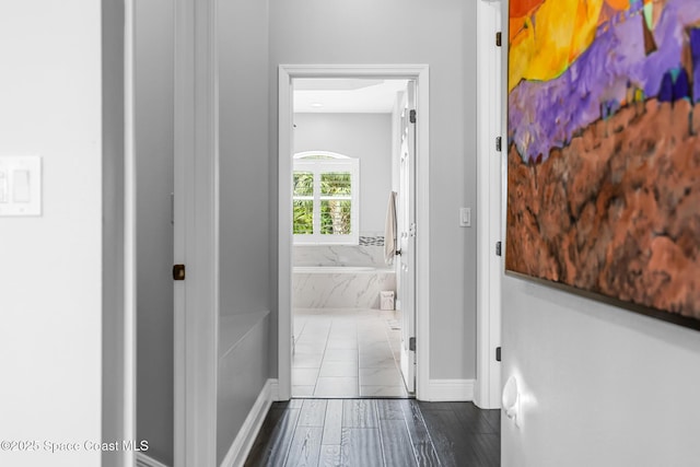 11 Pisces Ln, Rockledge, FL 32955 - hall featuring baseboards and dark wood-style flooring