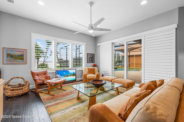 11 Pisces Ln, Rockledge, FL 32955 - living room featuring healthy amount of natural light, a ceiling fan, hardwood / wood-style flooring, and recessed lighting
