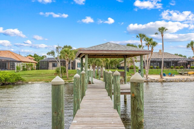 11 Pisces Ln, Rockledge, FL 32955 - dock featuring a water view, a yard, and a gazebo