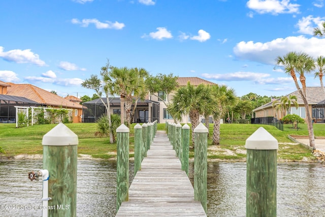 11 Pisces Ln, Rockledge, FL 32955 - dock area featuring a water view and a yard