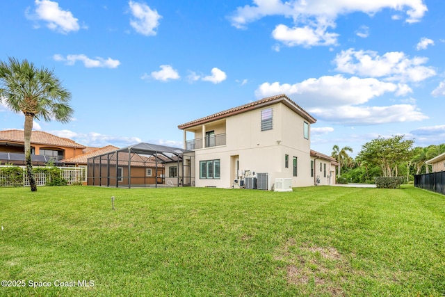 11 Pisces Ln, Rockledge, FL 32955 - back of property featuring a lanai and stucco siding