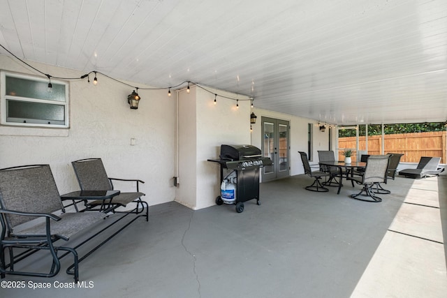 816 Pine Shadows Ave W, Rockledge, FL 32955 - view of patio / terrace with french doors, area for grilling, and outdoor dining area