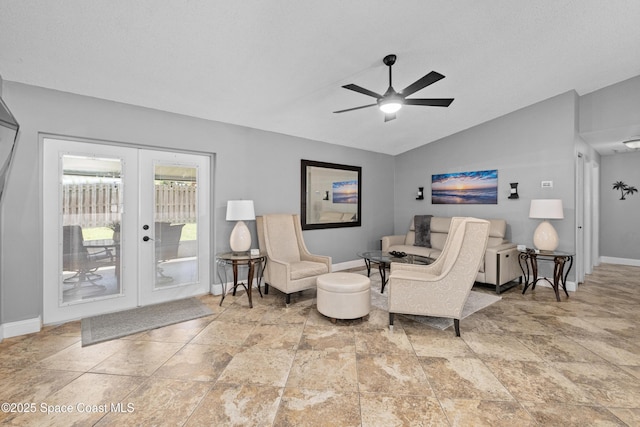 816 Pine Shadows Ave W, Rockledge, FL 32955 - living area with stone finish floors, vaulted ceiling, french doors, and a ceiling fan