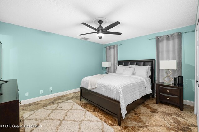 816 Pine Shadows Ave W, Rockledge, FL 32955 - bedroom featuring baseboards and a ceiling fan
