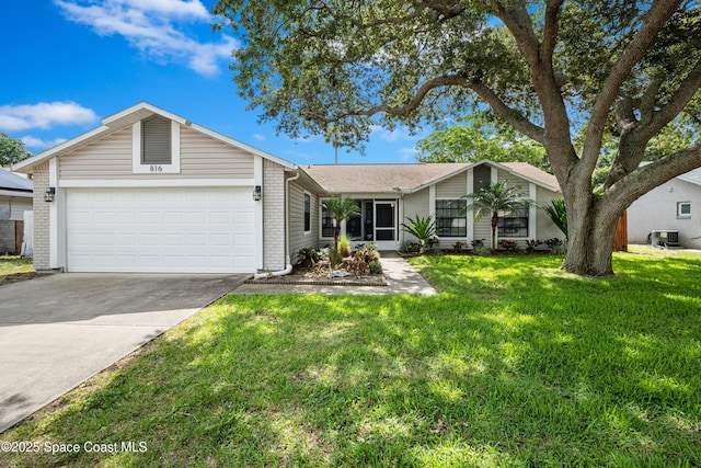 816 Pine Shadows Ave W, Rockledge, FL 32955 - ranch-style home with brick siding, an attached garage, driveway, and a front yard