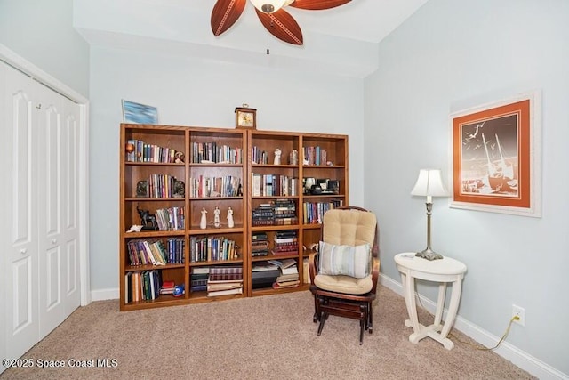 601 N Miramar Ave Unit 314, Indialantic, FL 32903 - sitting room with carpet flooring, ceiling fan, and baseboards