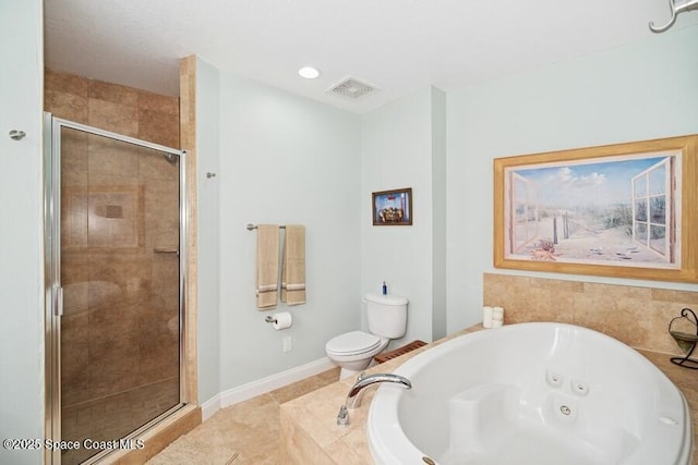601 N Miramar Ave Unit 314, Indialantic, FL 32903 - bathroom featuring a whirlpool tub, toilet, a shower stall, and tile patterned flooring