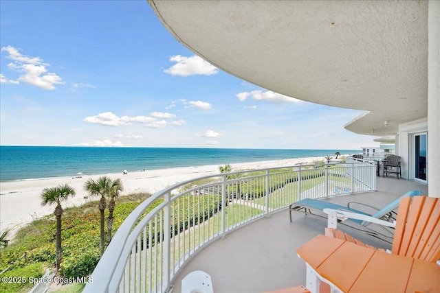 601 N Miramar Ave Unit 314, Indialantic, FL 32903 - balcony featuring view of water and beach