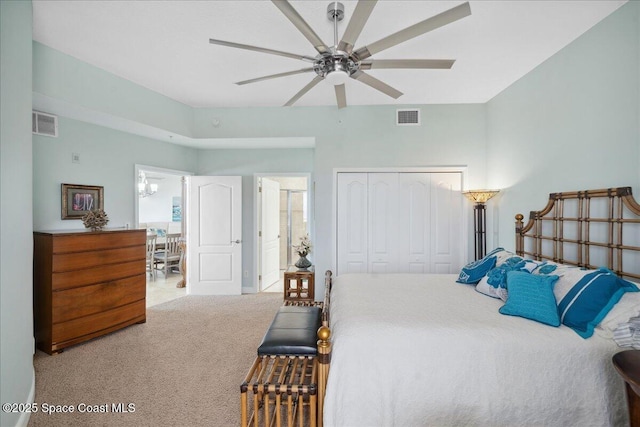601 N Miramar Ave Unit 314, Indialantic, FL 32903 - bedroom featuring a closet, carpet floors, and a ceiling fan