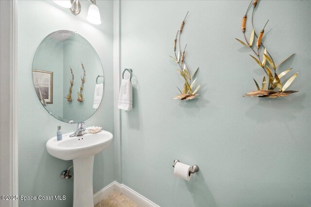 601 N Miramar Ave Unit 314, Indialantic, FL 32903 - bathroom with baseboards