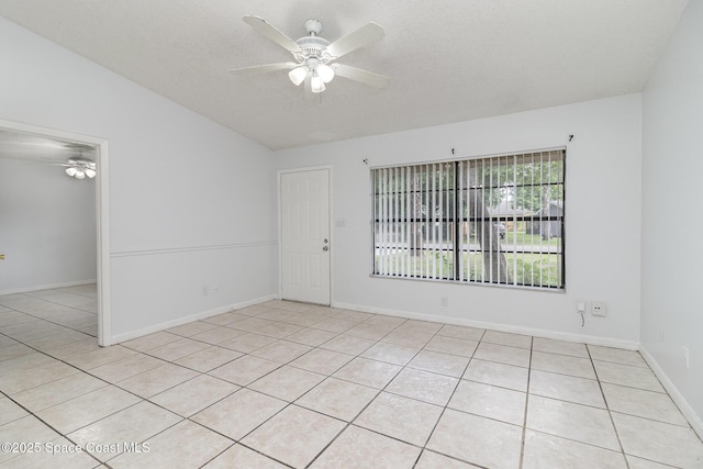 7413 Ester Rd, Cocoa, FL 32927 - unfurnished room with a ceiling fan, light tile patterned floors, and a textured ceiling
