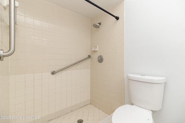7413 Ester Rd, Cocoa, FL 32927 - bathroom with a tile shower and toilet