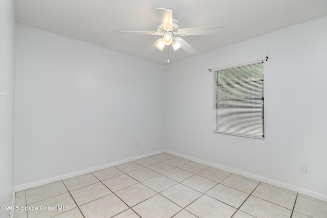 7413 Ester Rd, Cocoa, FL 32927 - unfurnished room featuring a ceiling fan and light tile patterned floors