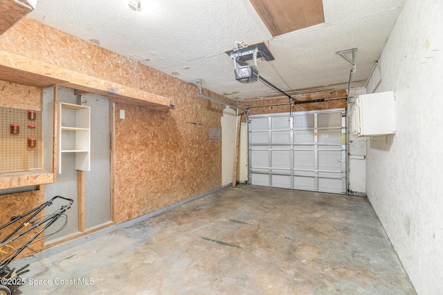 7413 Ester Rd, Cocoa, FL 32927 - garage featuring a garage door opener