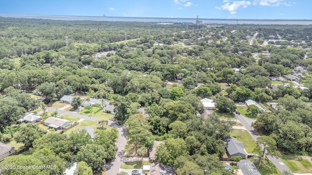 7413 Ester Rd, Cocoa, FL 32927 - aerial perspective of suburban area featuring a forest
