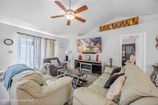 402 Ainsley St SE, Palm Bay, FL 32909 - living area with vaulted ceiling and a ceiling fan