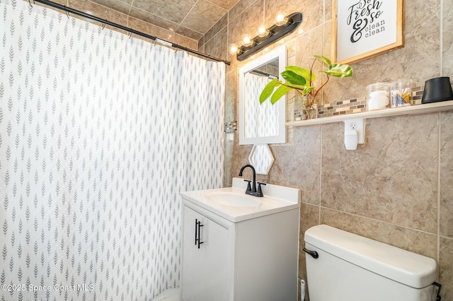 209 Plumosa Dr, Cocoa, FL 32922 - bathroom with vanity, a shower with curtain, and tile walls