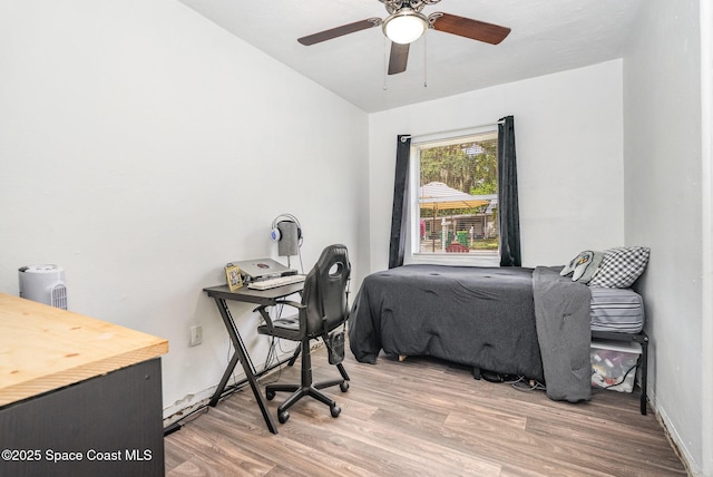 209 Plumosa Dr, Cocoa, FL 32922 - bedroom featuring wood finished floors, ceiling fan, and vaulted ceiling