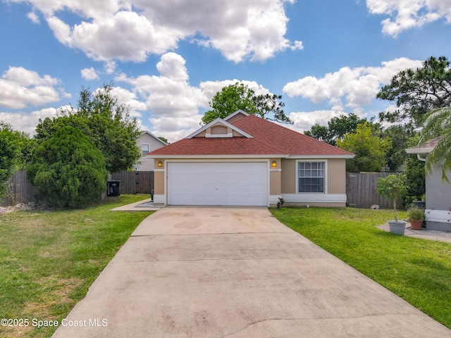 10360 Crystal Point Dr, Orlando, FL 32825 - view of front of property featuring stucco siding, driveway, a garage, and a shingled roof