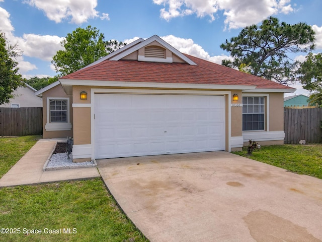 10360 Crystal Point Dr, Orlando, FL 32825 - single story home with stucco siding, concrete driveway, a shingled roof, and a garage