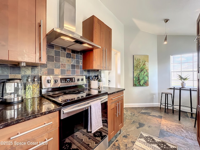 10360 Crystal Point Dr, Orlando, FL 32825 - kitchen with stainless steel electric stove, wall chimney exhaust hood, decorative backsplash, dark stone counters, and baseboards