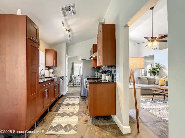 10360 Crystal Point Dr, Orlando, FL 32825 - kitchen featuring a ceiling fan, a sink, stainless steel dishwasher, backsplash, and open floor plan