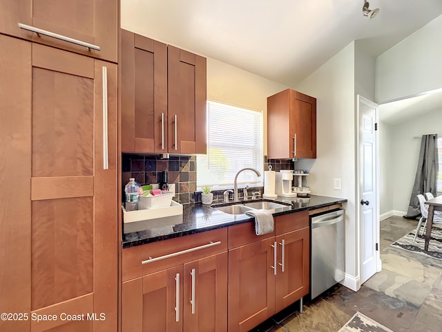 10360 Crystal Point Dr, Orlando, FL 32825 - kitchen with dishwasher, a sink, dark stone countertops, baseboards, and decorative backsplash