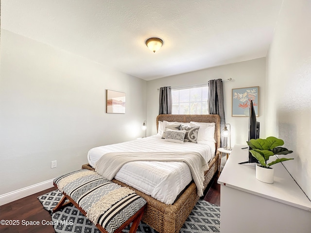 10360 Crystal Point Dr, Orlando, FL 32825 - bedroom featuring dark wood-style floors and baseboards