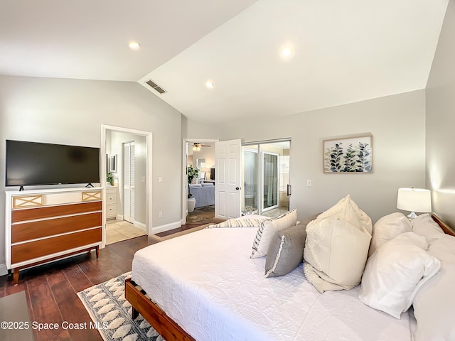 10360 Crystal Point Dr, Orlando, FL 32825 - bedroom with vaulted ceiling, wood finished floors, baseboards, a closet, and connected bathroom