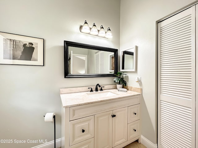 10360 Crystal Point Dr, Orlando, FL 32825 - bathroom with vanity and a closet