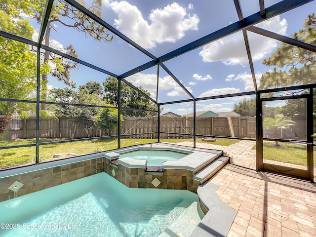 10360 Crystal Point Dr, Orlando, FL 32825 - view of pool featuring a lanai, a patio, and a pool with connected hot tub