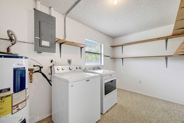 1123 Hermosa Dr, Rockledge, FL 32955 - laundry area with electric water heater, electric panel, washer and dryer, a textured ceiling, and baseboards