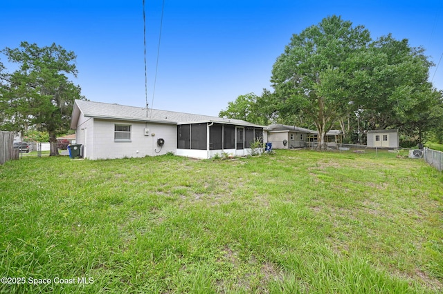 1123 Hermosa Dr, Rockledge, FL 32955 - view of yard featuring a sunroom