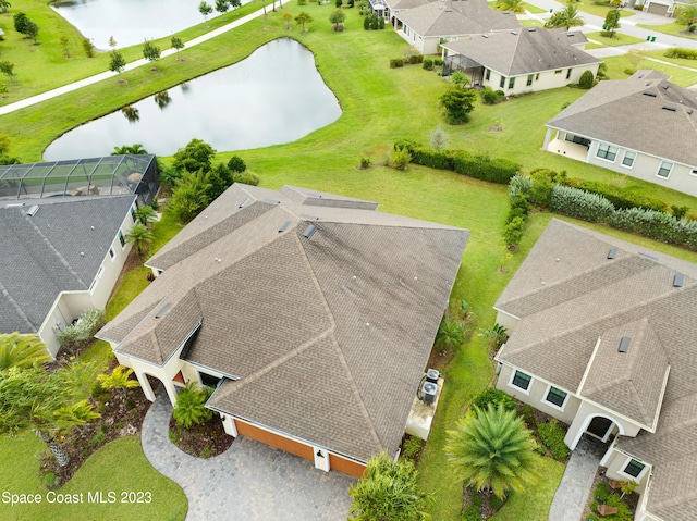 7406 Millbrook Ave, Melbourne, FL 32940 - aerial perspective of suburban area featuring a nearby body of water