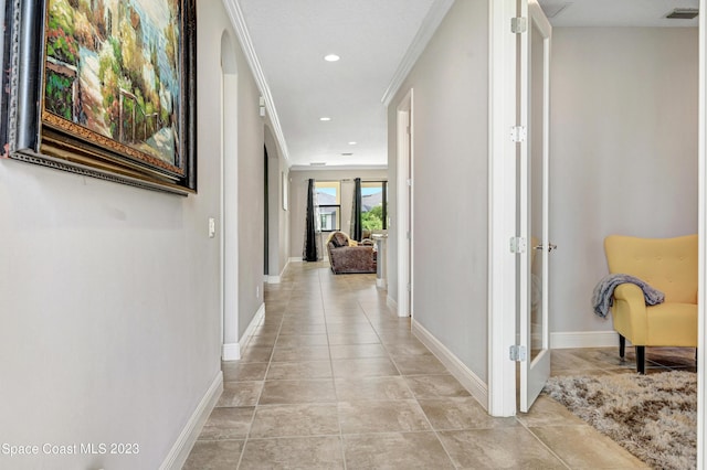 7406 Millbrook Ave, Melbourne, FL 32940 - hallway featuring light tile patterned floors and recessed lighting