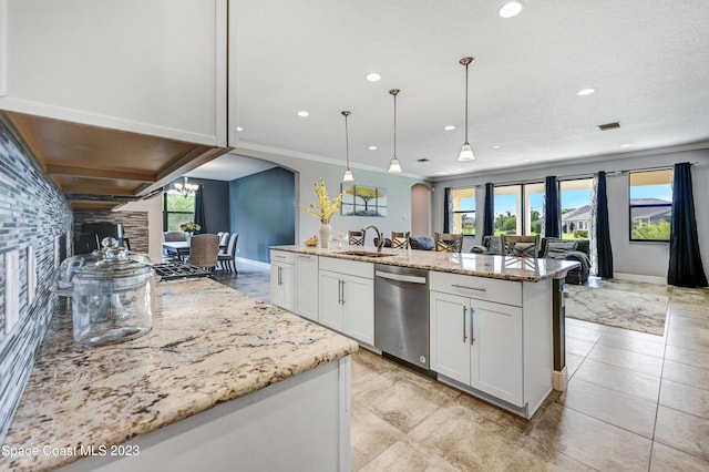 7406 Millbrook Ave, Melbourne, FL 32940 - kitchen featuring dishwasher, open floor plan, arched walkways, white cabinets, and light stone counters
