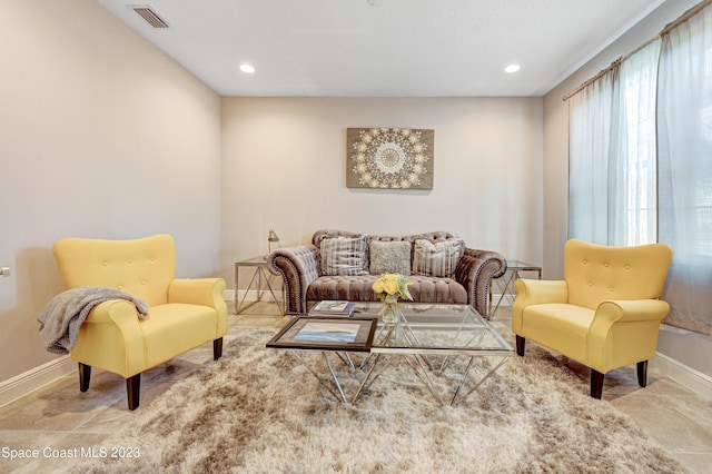 7406 Millbrook Ave, Melbourne, FL 32940 - living area featuring recessed lighting