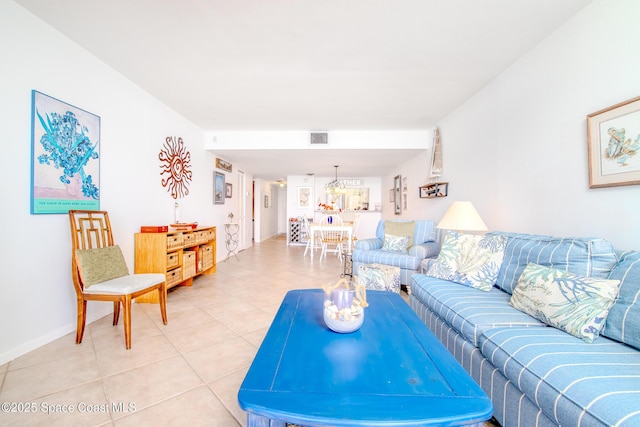3060 N Atlantic Ave Unit 602, Cocoa Beach, FL 32931 - living room with light tile patterned floors and baseboards