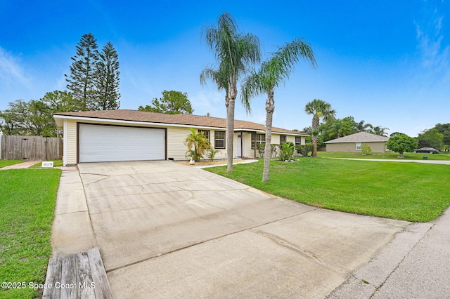 409 Stendal Rd NW, Palm Bay, FL 32907 - single story home featuring a garage and driveway