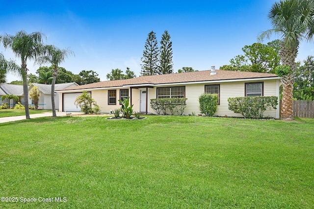 409 Stendal Rd NW, Palm Bay, FL 32907 - ranch-style house with an attached garage and driveway
