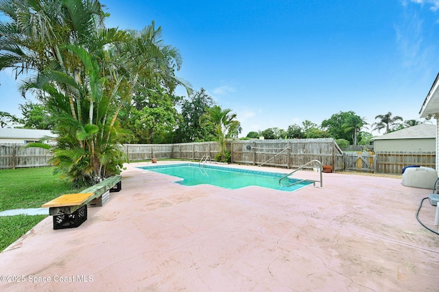 409 Stendal Rd NW, Palm Bay, FL 32907 - view of swimming pool featuring a patio area