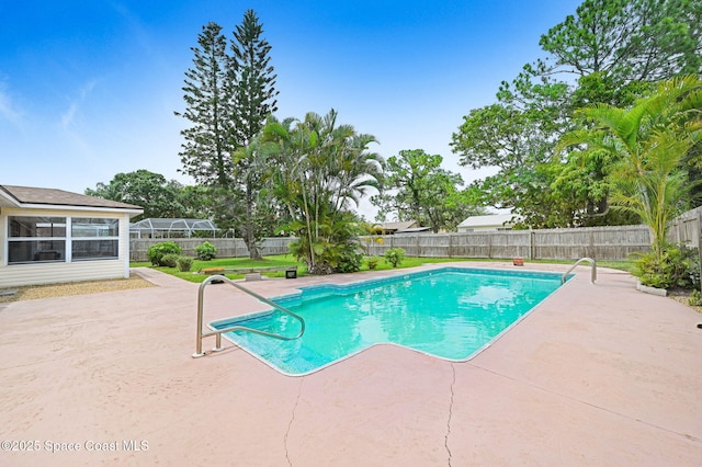 409 Stendal Rd NW, Palm Bay, FL 32907 - view of swimming pool featuring a patio area and a fenced backyard