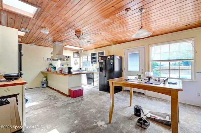 409 Stendal Rd NW, Palm Bay, FL 32907 - kitchen featuring black fridge with ice dispenser, wooden ceiling, open shelves, a skylight, and wooden counters