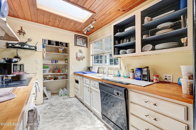 409 Stendal Rd NW, Palm Bay, FL 32907 - kitchen featuring butcher block counters, black dishwasher, a sink, open shelves, and a skylight