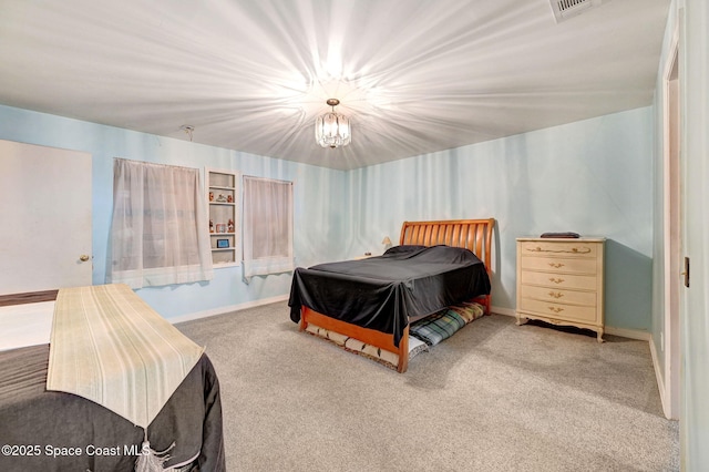 409 Stendal Rd NW, Palm Bay, FL 32907 - bedroom with carpet floors, baseboards, and a chandelier