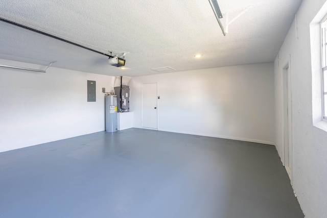 306 Harvey Ave NE, Palm Bay, FL 32907 - garage with a garage door opener, electric water heater, and electric panel