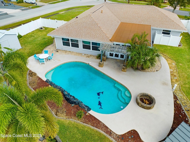1455 Centaurus Ct, Merritt Island, FL 32953 - outdoor pool featuring a patio area, a fenced backyard, and french doors