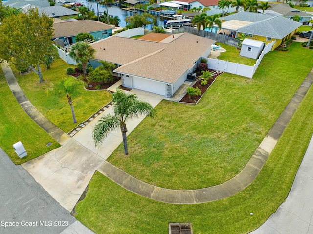 1455 Centaurus Ct, Merritt Island, FL 32953 - aerial view of residential area featuring a nearby body of water